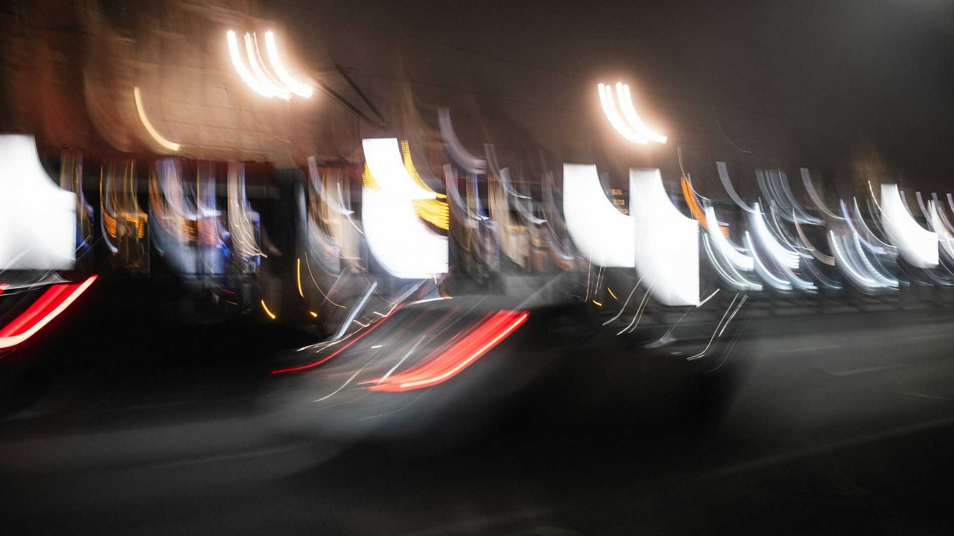 An abstract streaks of light of cars at night on a street